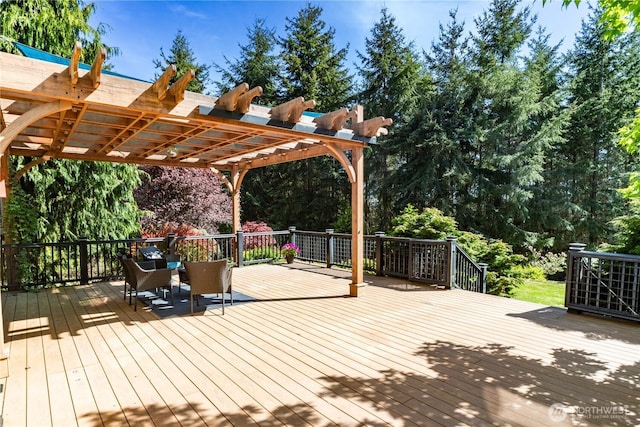 702 Woodland Dr, Port Townsend, WA 98368 - wooden terrace with a pergola and view of scattered trees
