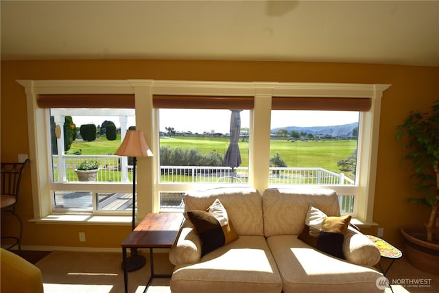 327 Buttercup Ln SW, Mattawa, WA 99349 - carpeted living room with baseboards and a mountain view