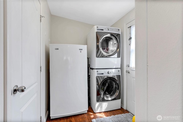 4805 Cushman Rd NE Unit 61, Olympia, WA 98506 - clothes washing area featuring stacked washer / dryer and wood finished floors