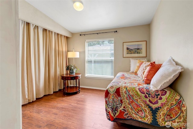 4805 Cushman Rd NE Unit 61, Olympia, WA 98506 - bedroom featuring wood finished floors, baseboards, and vaulted ceiling