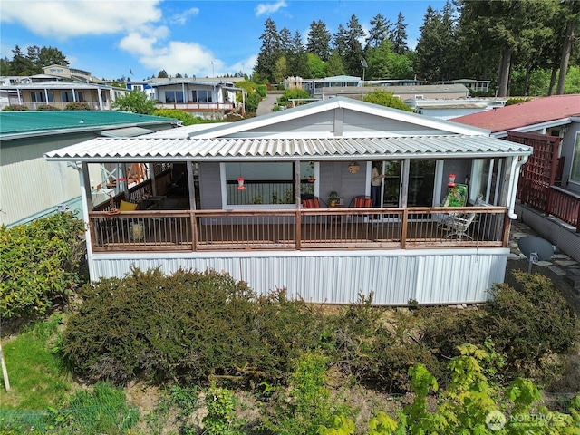 4805 Cushman Rd NE Unit 61, Olympia, WA 98506 - rear view of house with metal roof