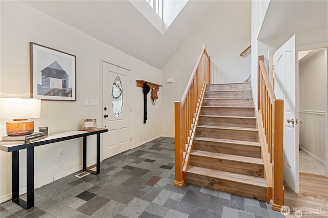 30521 NE 147th Ct, Battle Ground, WA 98604 - stairway with a skylight, lofted ceiling, and baseboards