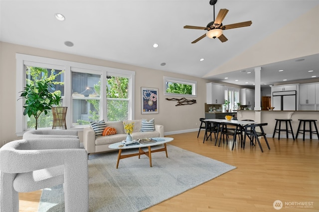 257 3rd Ave, Fox Island, WA 98333 - living room featuring light wood finished floors, a ceiling fan, lofted ceiling, baseboards, and recessed lighting