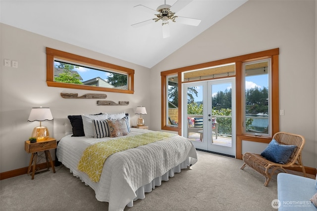 257 3rd Ave, Fox Island, WA 98333 - bedroom with french doors, access to outside, carpet floors, multiple windows, and lofted ceiling