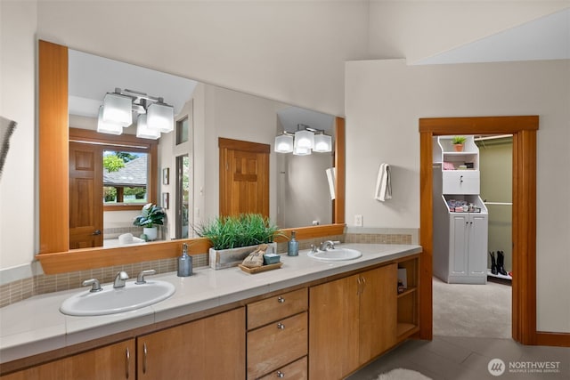 257 3rd Ave, Fox Island, WA 98333 - bathroom with double vanity and tile patterned flooring