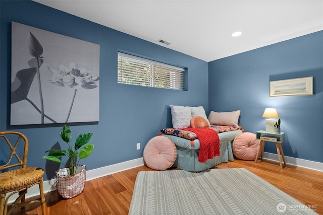 257 3rd Ave, Fox Island, WA 98333 - bedroom with baseboards, wood finished floors, and recessed lighting
