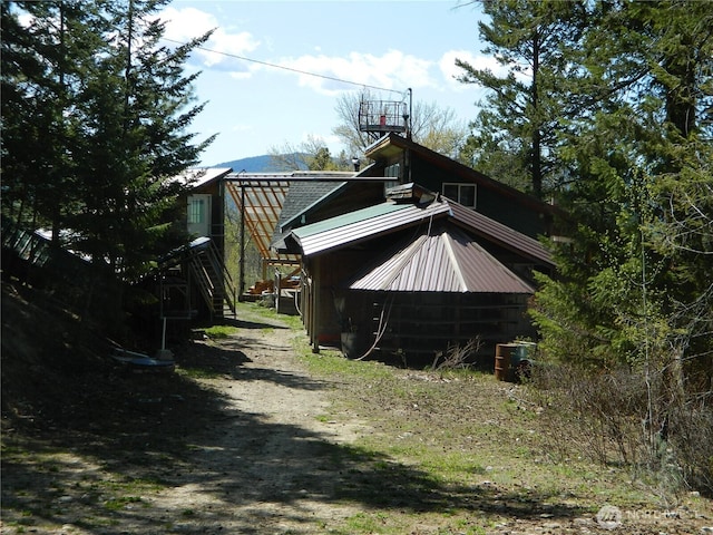 0 High Country Dr W, Tonasket, WA 98855 - view of property exterior featuring metal roof