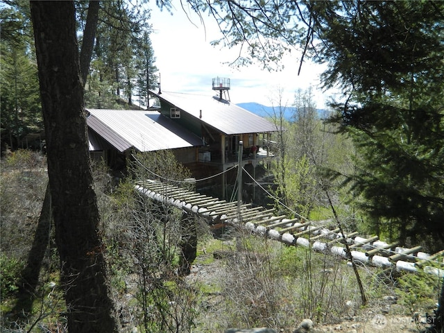 0 High Country Dr W, Tonasket, WA 98855 - view of property exterior featuring metal roof