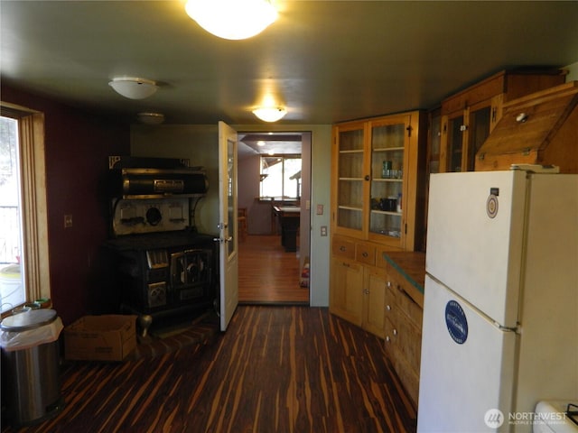 0 High Country Dr W, Tonasket, WA 98855 - kitchen with freestanding refrigerator, dark wood-style floors, plenty of natural light, and glass insert cabinets
