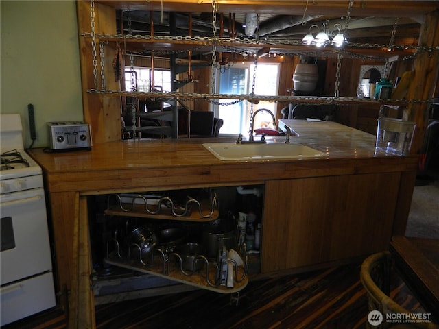 0 High Country Dr W, Tonasket, WA 98855 - kitchen featuring white range with gas stovetop and a sink