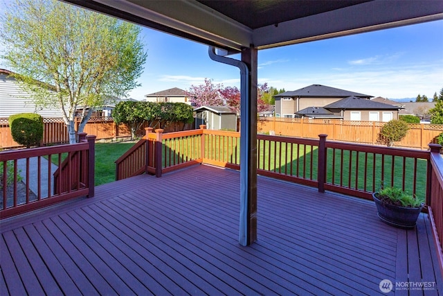 6130 Pacific Heights Dr, Ferndale, WA 98248 - wooden terrace featuring a shed, an outdoor structure, and a residential view