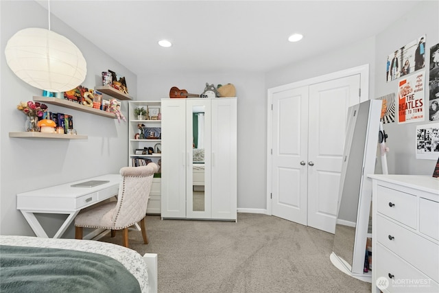 bedroom featuring carpet flooring, recessed lighting, and a closet