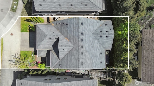 aerial view of property and surrounding area with property parcel outlined