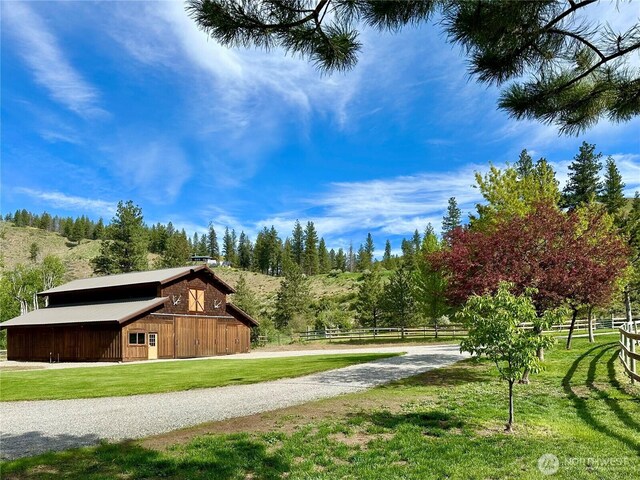 639 Twisp River Rd, Twisp, WA 98856 - view of property's community with a barn and an outbuilding