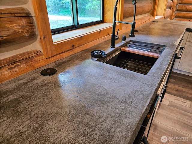 31314 555th Street Ct E, Ashford, WA 98304 - kitchen view of a sink and wood finished floors