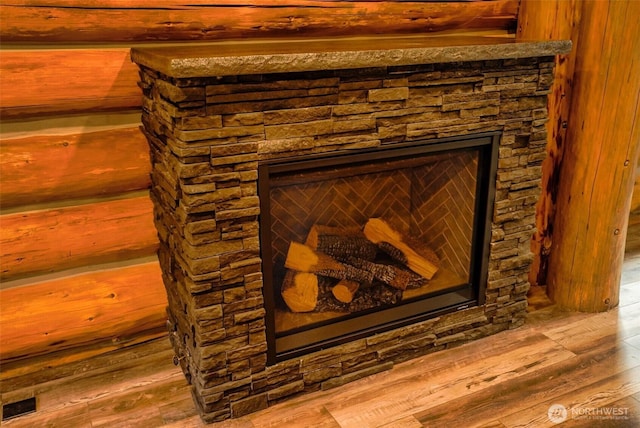 31314 555th Street Ct E, Ashford, WA 98304 - detailed view of a fireplace and wood finished floors