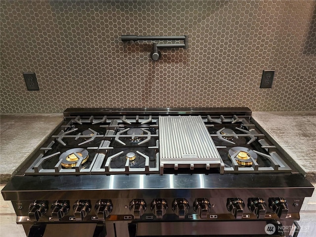 31314 555th Street Ct E, Ashford, WA 98304 - detailed view of tasteful backsplash and gas range
