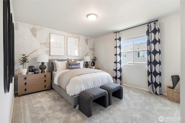 carpeted bedroom featuring baseboards