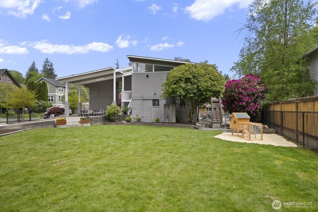 rear view of property featuring a patio
