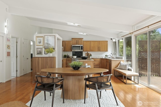 dining room featuring light wood-style flooring