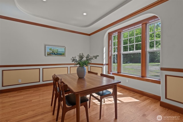 13514 95th Ave NE, Arlington, WA 98223 - dining room with arched walkways and light wood-style floors