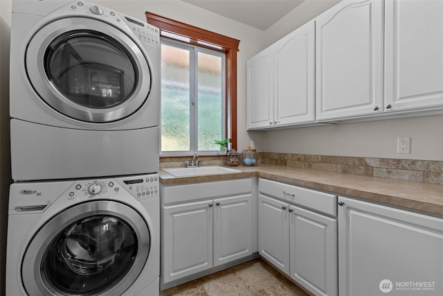 13514 95th Ave NE, Arlington, WA 98223 - clothes washing area featuring stacked washer / dryer and cabinet space