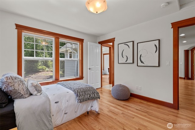 13514 95th Ave NE, Arlington, WA 98223 - bedroom with light wood-style floors, baseboards, and arched walkways