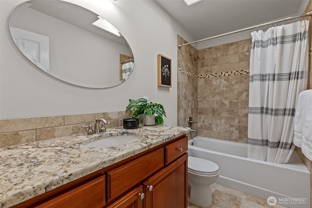 13514 95th Ave NE, Arlington, WA 98223 - bathroom featuring shower / bath combo with shower curtain, vanity, and toilet