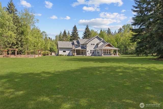 13514 95th Ave NE, Arlington, WA 98223 - rear view of house with a lawn