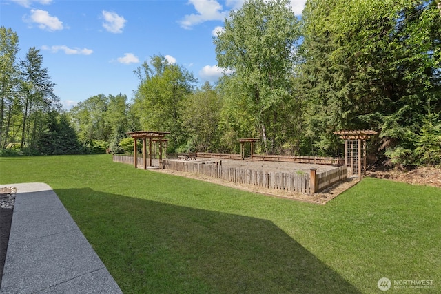 13514 95th Ave NE, Arlington, WA 98223 - view of green lawn featuring a pergola