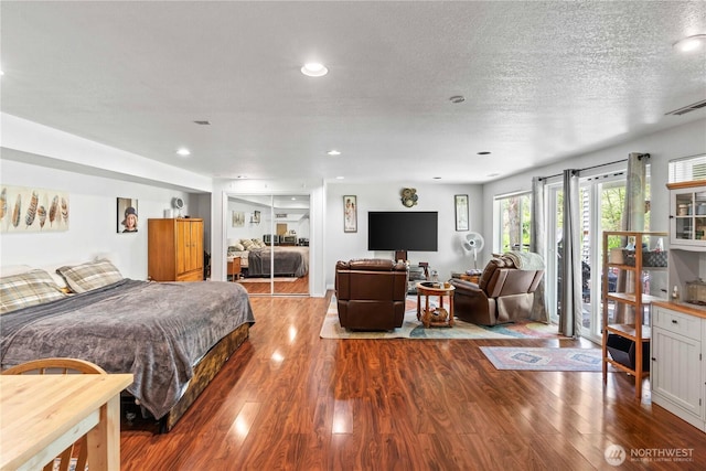 2219 W Pioneer Ave, Puyallup, WA 98371 - bedroom featuring wood finished floors and recessed lighting