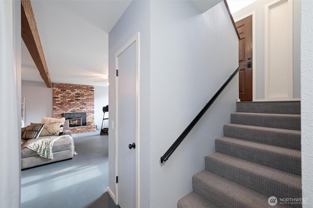 stairs featuring concrete floors