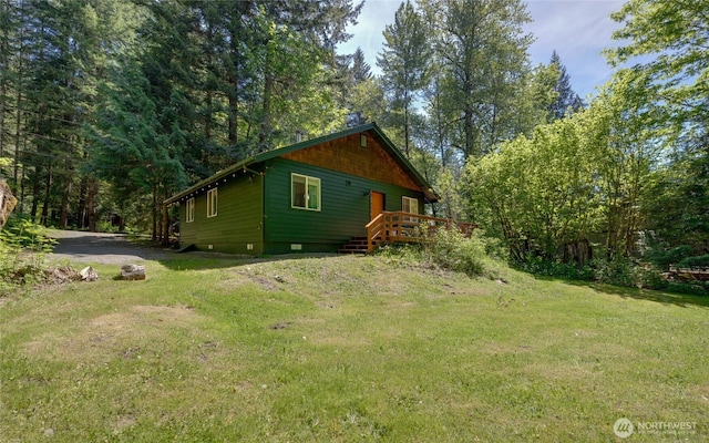 7537 Canyon View Dr, Glacier, WA 98244 - view of property exterior with a lawn and a wooden deck