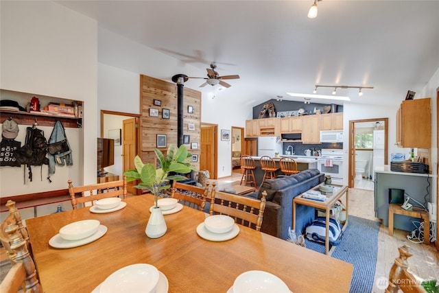 7537 Canyon View Dr, Glacier, WA 98244 - dining space featuring lofted ceiling, ceiling fan, track lighting, and light wood-type flooring