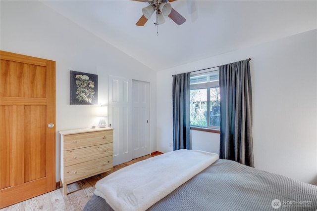 7537 Canyon View Dr, Glacier, WA 98244 - bedroom featuring lofted ceiling, light wood-style floors, a ceiling fan, and a closet