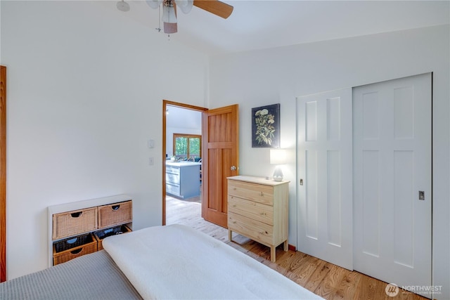 7537 Canyon View Dr, Glacier, WA 98244 - bedroom featuring light wood-type flooring, ceiling fan, and vaulted ceiling