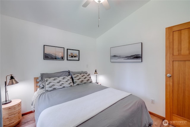 7537 Canyon View Dr, Glacier, WA 98244 - bedroom with lofted ceiling, light wood-style floors, baseboards, and ceiling fan