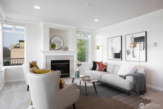 living room with ornamental molding, baseboards, light colored carpet, a tile fireplace, and recessed lighting