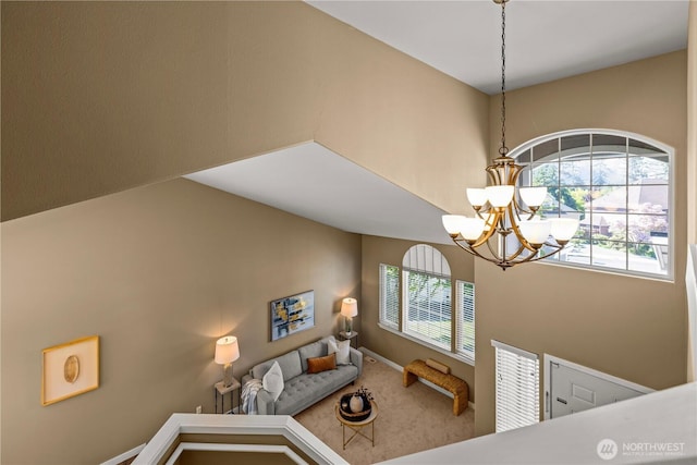 detailed view of a chandelier and baseboards
