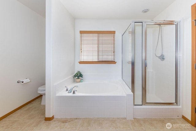 full bathroom with toilet, a shower stall, and a garden tub