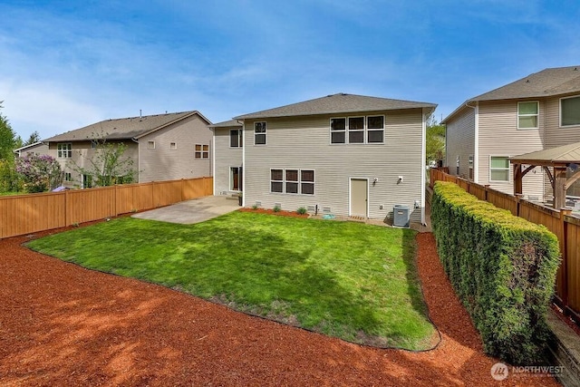 back of house featuring a patio area and central AC unit