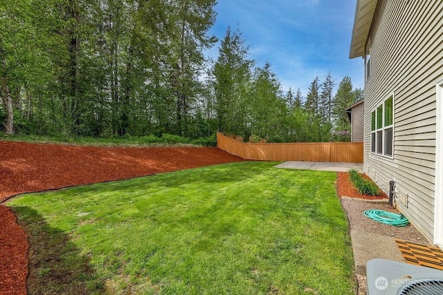 view of yard featuring central AC