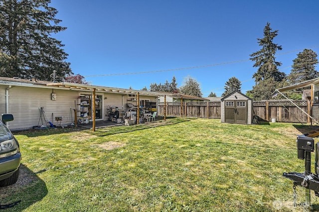4503 Yew Ln SW, Lakewood, WA 98499 - view of yard with a shed, an outdoor structure, and a patio