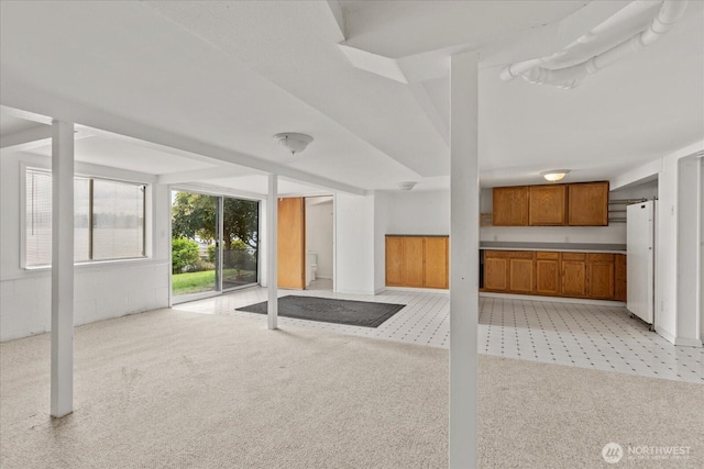 10918 Vernon Rd, Lake Stevens, WA 98258 - unfurnished living room featuring light colored carpet