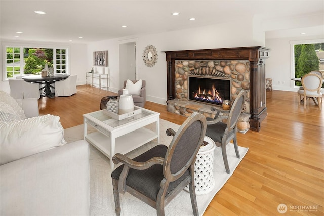 3204 Evergreen Point Rd, Medina, WA 98039 - living area featuring healthy amount of natural light, light wood-style flooring, a fireplace, and recessed lighting