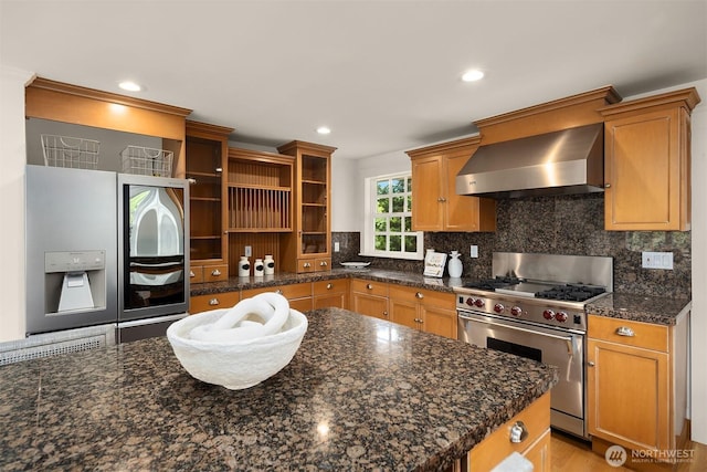 3204 Evergreen Point Rd, Medina, WA 98039 - kitchen featuring wall chimney range hood, appliances with stainless steel finishes, open shelves, backsplash, and recessed lighting