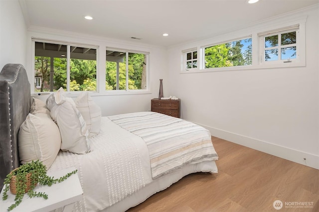 3204 Evergreen Point Rd, Medina, WA 98039 - bedroom featuring wood finished floors, ornamental molding, recessed lighting, and baseboards