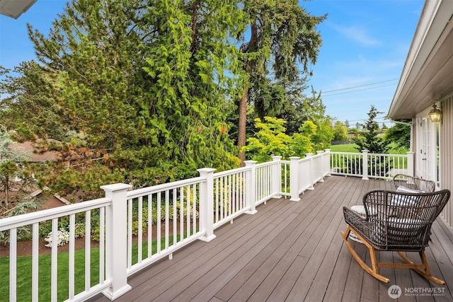 3204 Evergreen Point Rd, Medina, WA 98039 - deck featuring view of wooded area