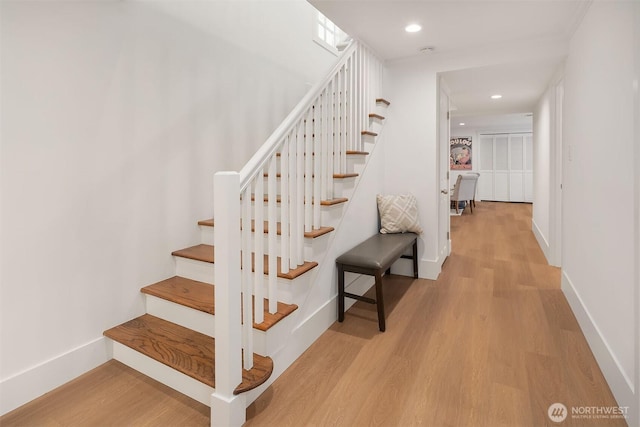 3204 Evergreen Point Rd, Medina, WA 98039 - stairway featuring wood finished floors, baseboards, and recessed lighting