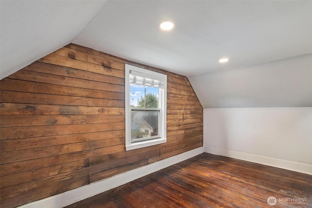 166 SW Lewis St, Chehalis, WA 98532 - additional living space featuring wood walls, baseboards, lofted ceiling, dark wood finished floors, and recessed lighting